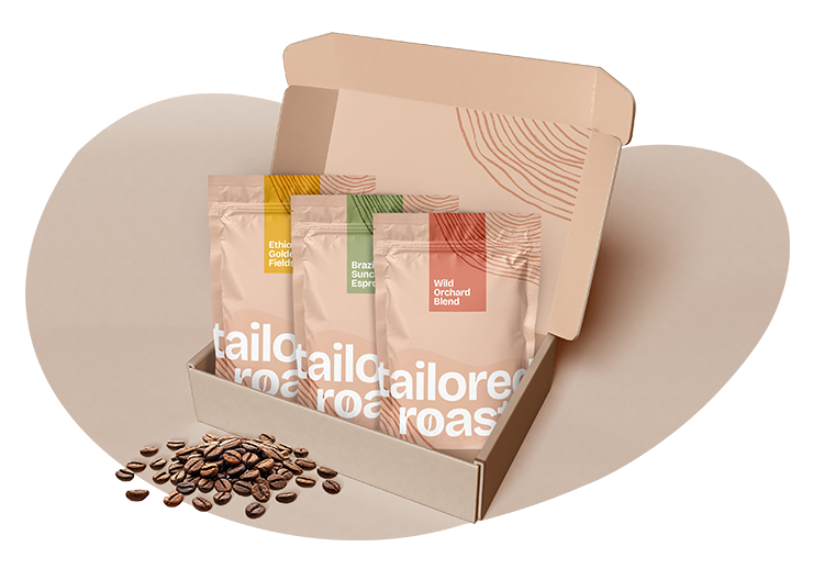A TailoredRoast subscription box with four bags of coffee and loose beans
